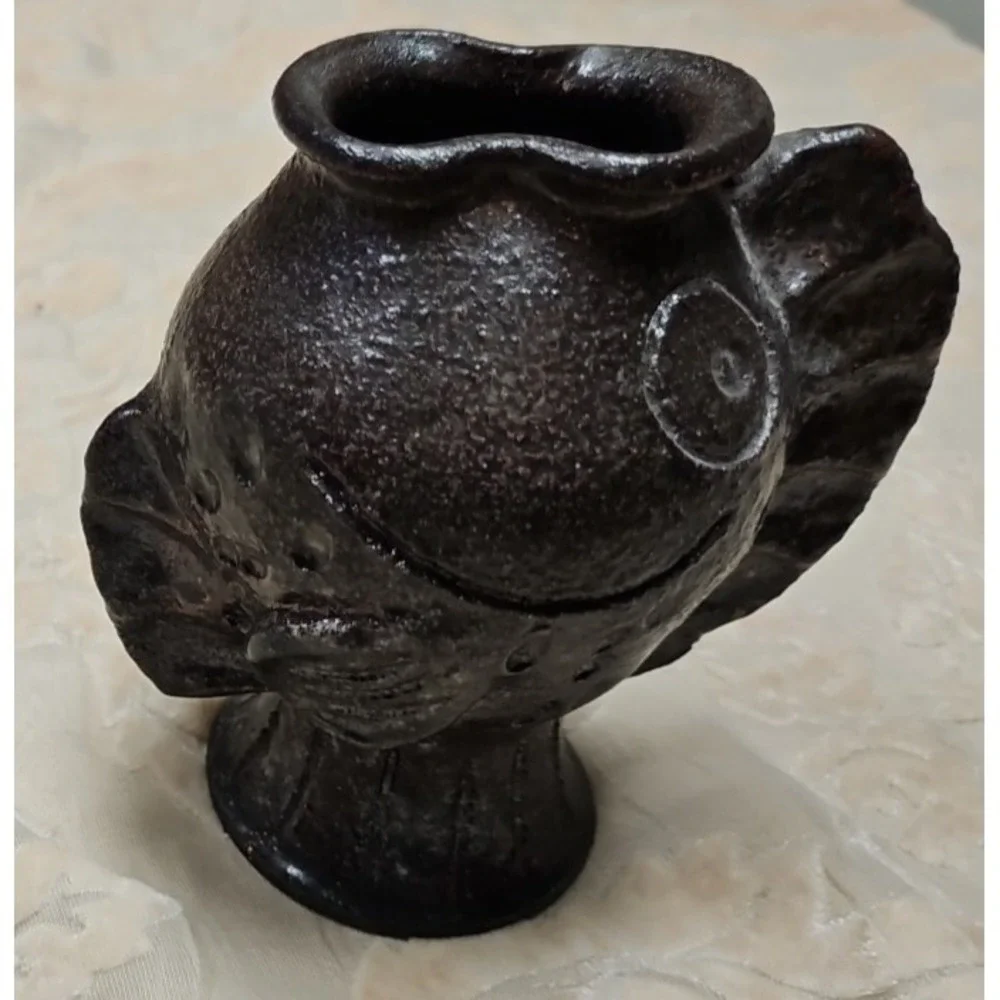 Vintage Vase Initialed BKH 2002.‎ Many differant faces depending on how it sits.